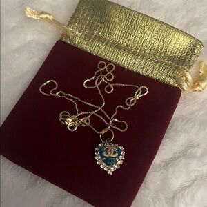 Authentic Chanel Blue Heart Necklace on a Sterling Silver Gold Tone Box Chain.